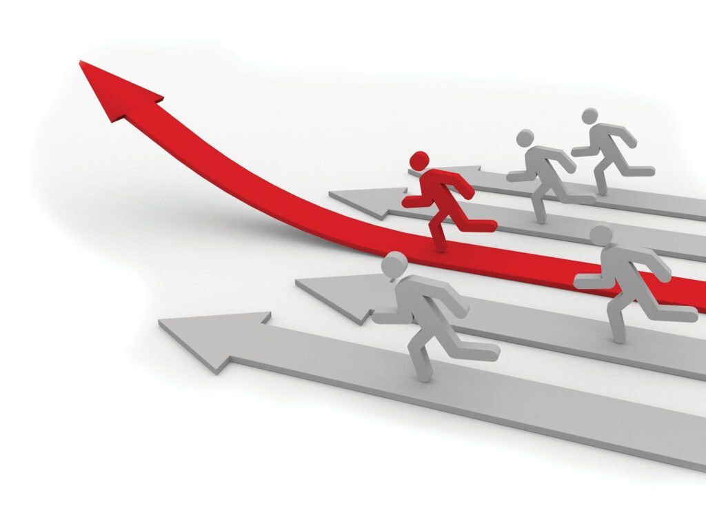 Business leader standing ahead of competitors